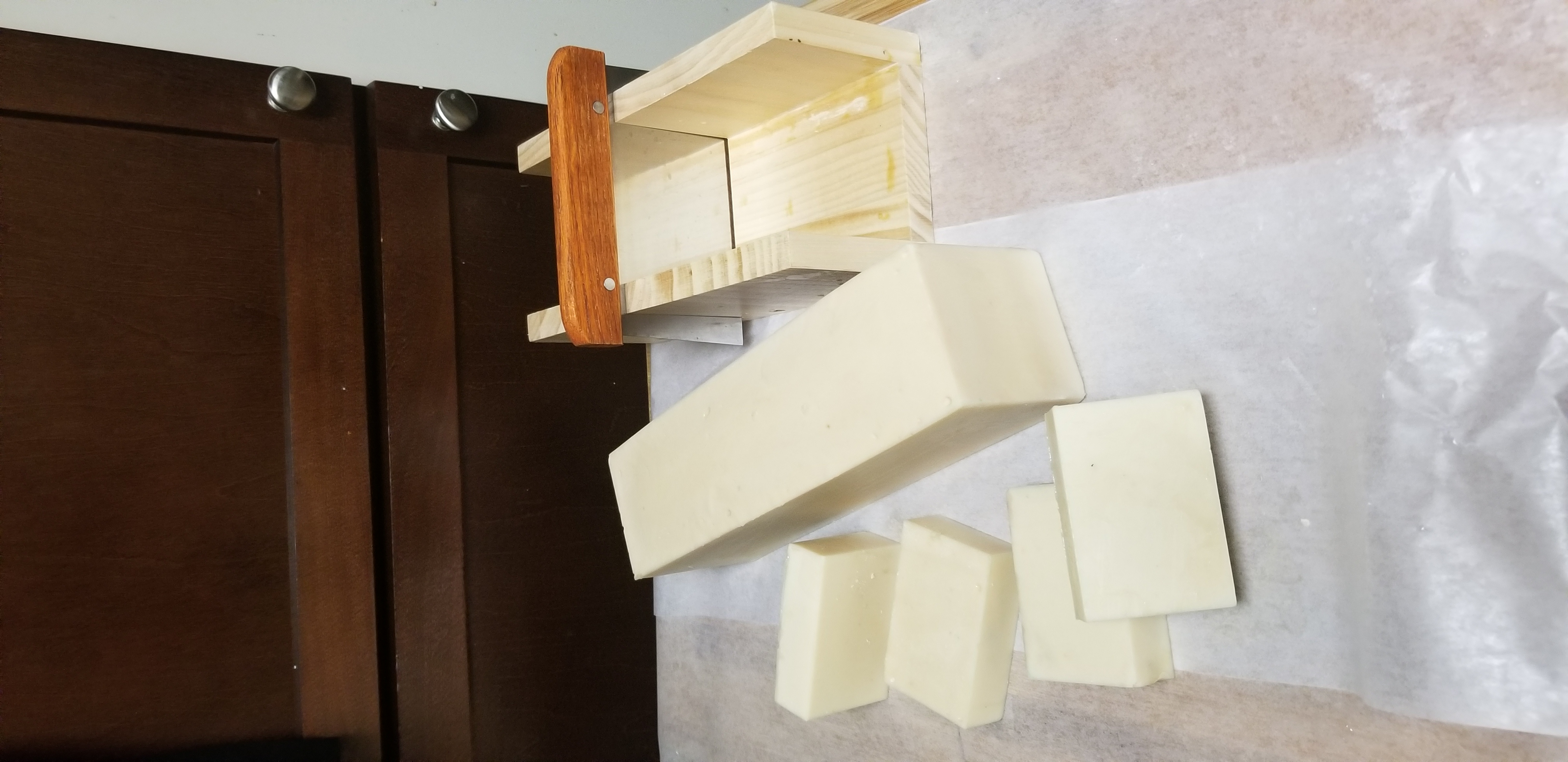 Pouring handmade soap into molds